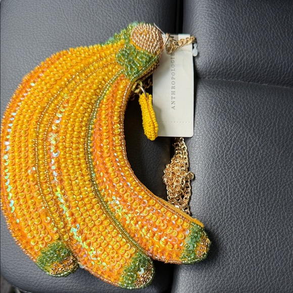 Anthropologie Handbags - Maeve beaded clutch with chain strap